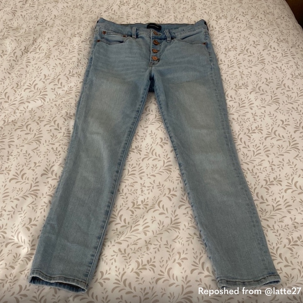 9” high rise toothpick jeans with button fly